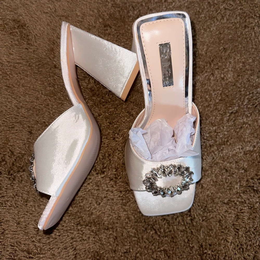 Beautiful white satin heel with rhinestone embellishment